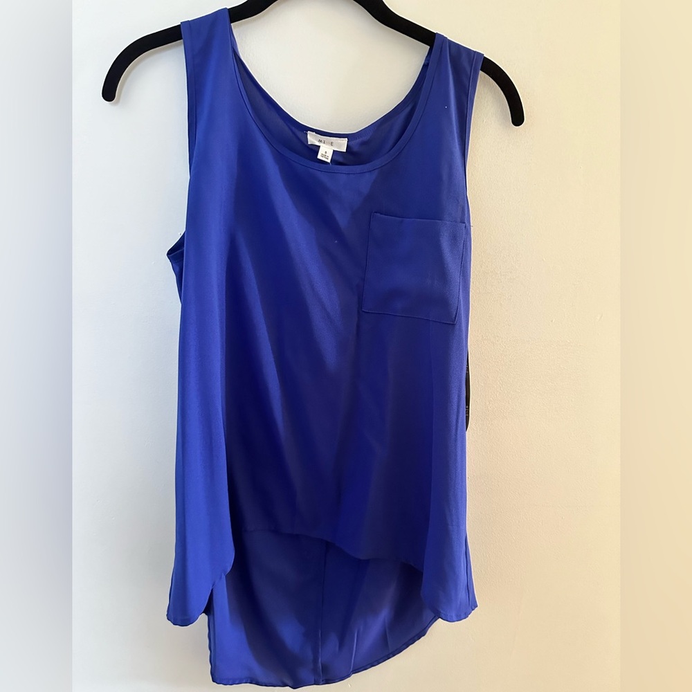 New high low blouse with open back and button detail on back